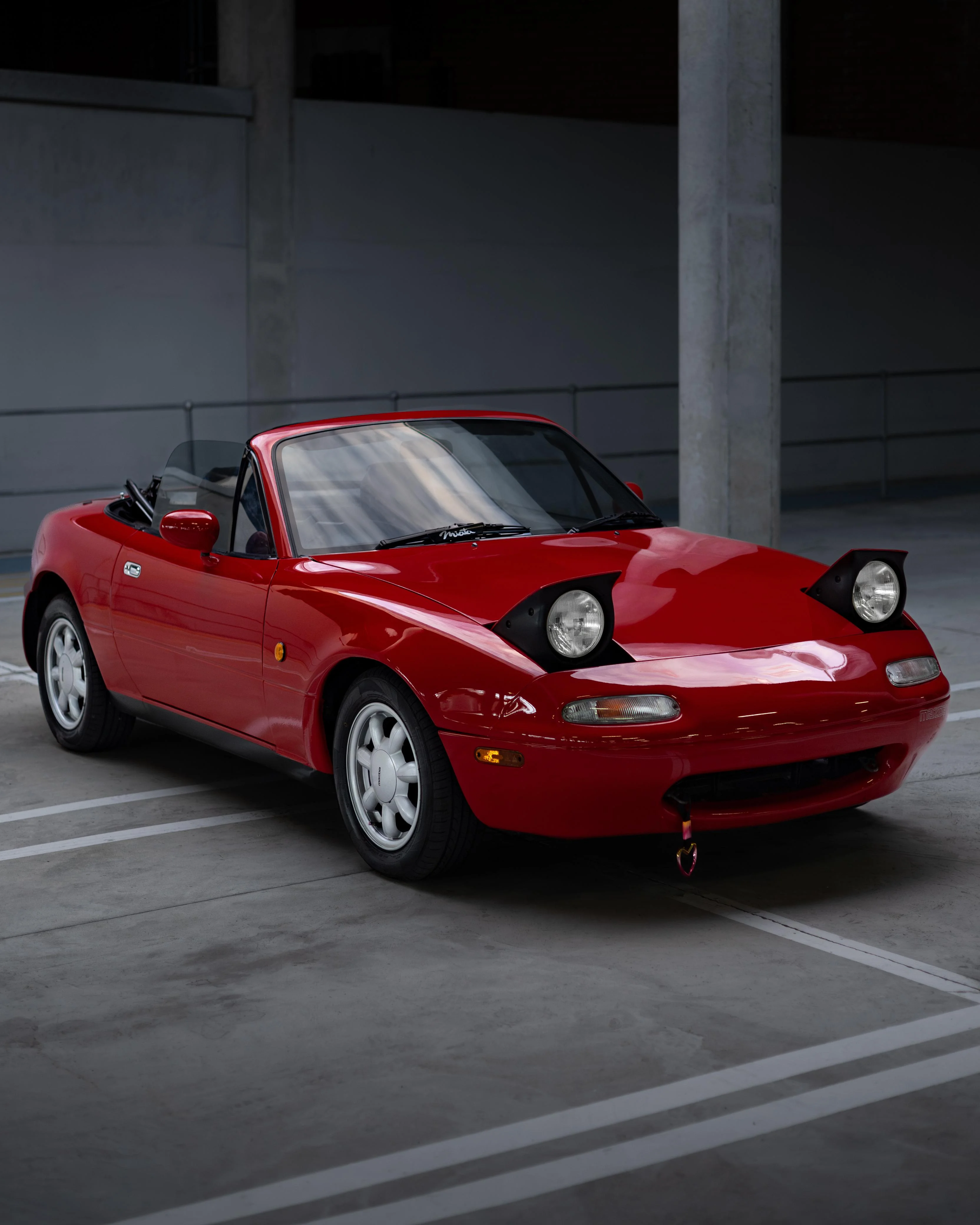 Red Mazda MX-5 NA front three-quarter